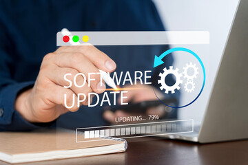 Man working and installing update process. Software updates or operating system upgrades to keep...