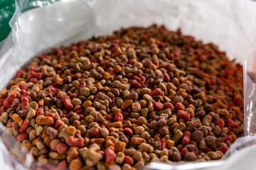 Close-Up of Dry Dog Food in an Open Bag