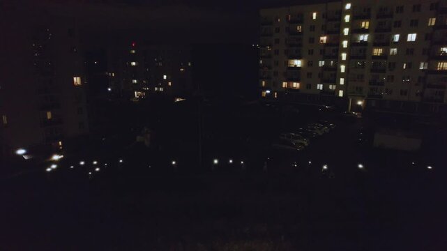 People with flashlights on a dark street, a flash mob of people against the dark, a protest of people with flashlights, people walking at night with flashlights