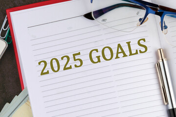 New Year New Start, Resolutions, Strategy, mission concept. 2025 GOALS there is a memo for analysis in the business notebook