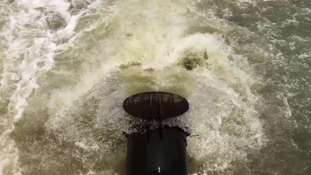 Turbid water by outflow pipe caused water pollution. Dirty waste water sewage flows from a pipe and pollutes river. World environment contamination issue. Water pollution by a wrong sewage system.
