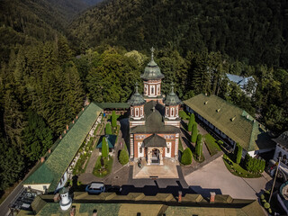 Frontal drone view of the Sinaia monastery in Romania. 