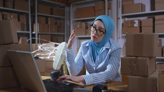 a problem of hot weather,summer heat and overheating woman worker hijab