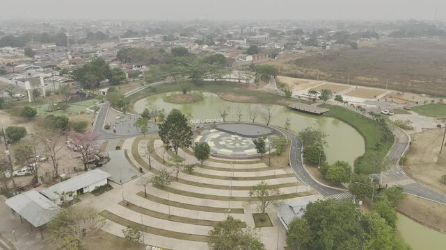 Drone flies over main entrance to Parque da Cidade on smokey afternoon from wildfires in Porto Velho, Rond&ocirc;nia, Brazil