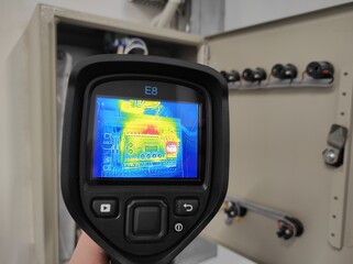 Inspection with a building thermal imager.