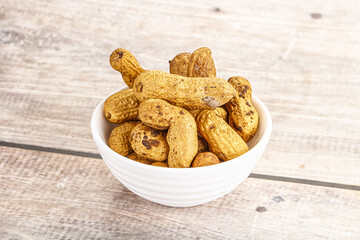 Raw ripe unpeeled peanut heap