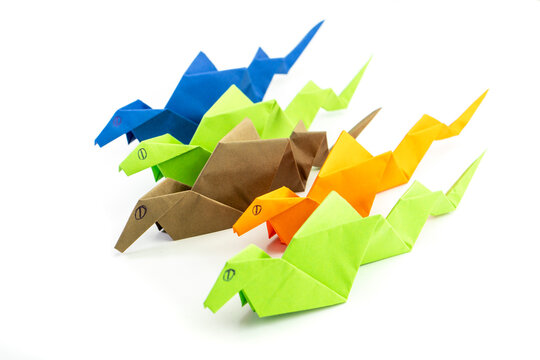 2025 New Year with true paper snake. Animal reptile concept origami isolated on white background