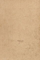 Recycled paper texture. Craft carton material background. Aged beige paper texture for backgrounds and design elements