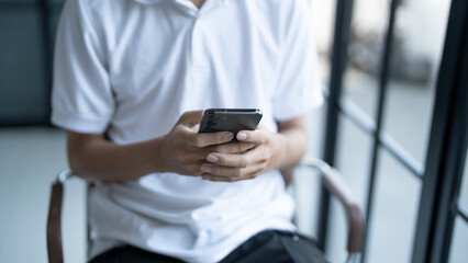 Man hold smartphone modern technology engagement in daily life