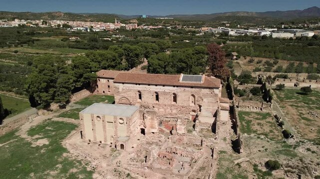 General drone shot of the surroundings of the monastery of the Cartuja Vall de Cristo with the village of Altura, Castell&oacute;n, in the background