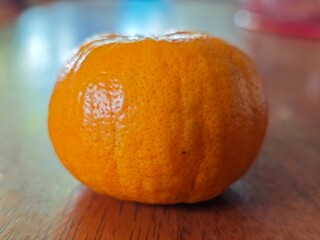 Orange on table