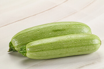 Raw green ripe zucchini vegetable