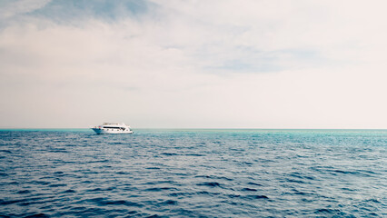 white cruise tourist boat in the Red Sea in Egypt