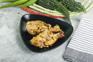 Chicken leg tikka with spices