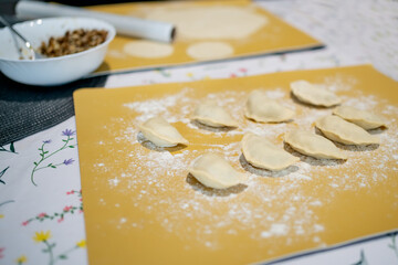 homemade food on the table - varenyky, pierogi with mushrooms. Ukraine cuisine, natural homemade food