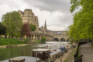 A group boats on the River Avon on the Spring Gardens Road in Bath Somerset