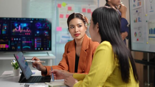 Asian office team brainstorming, planning for group problem solving, creative teamwork and presentation. Planning the meeting Income clarification Business results, startup business ideas.
