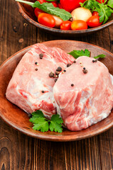 Raw cuts of pork meat.