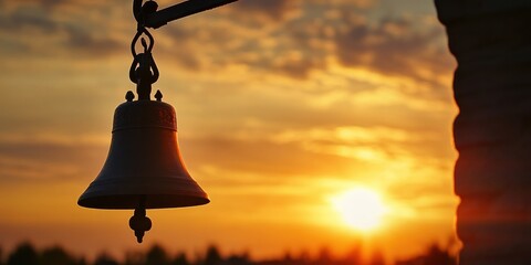 church bell ringing at sunset