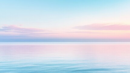 Obraz premium A beautiful blue ocean with a pink sky in the background. The sky is filled with clouds, giving the scene a serene and peaceful atmosphere