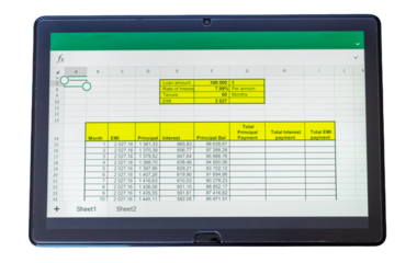 Shot of an excel sheet on tablet screen showing bank loan amortization table on the transparent background