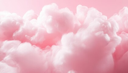 A pink cloud filled with fluffy cotton candy. The cloud is pink and fluffy, giving off a light and airy feeling