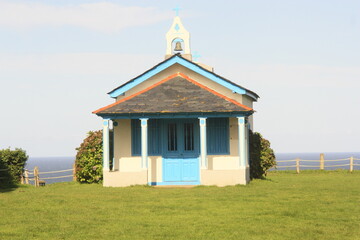 Ermita de La Regalina, acantilados y playa de Cadavedo Asturias.