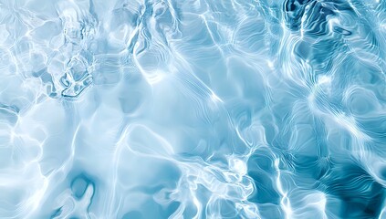 Abstract image of blue water ripples, creating a fluid and dynamic background.