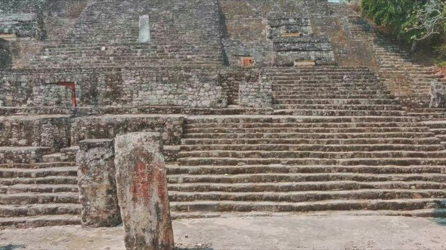 The video showcases the ancient Mayan ruins of Ek Balam, located in the Yuc atan Peninsula of Mexico. These impressive ruins are a testament to the advanced civilization that once thrived in the