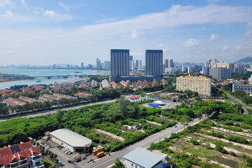 Fototapeta premium Aerial view Straits Quay and residential housing area and commercial buildings at Tanjung Tokong, Penang. 