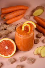 Autumn vegetable vitamin smoothie. Freshly squeezed juice. vegetables. Carrot, ginger, orange. Taste and benefits.