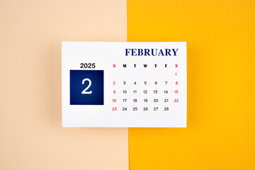 February Calendar 2025 page on yellow background.