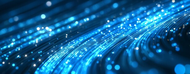 Fototapeta premium Digital Blue Light Fibers Accelerating. Dynamic blue optical fibers emitting light, representing high-speed data transfer and connectivity. 