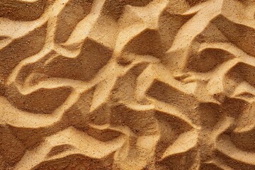 Photo of Beach yellow sand surface. Background texture for backdrops or mapping