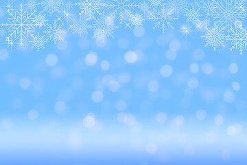 Christmas Blue Background with Snowflakes. Abstract blurred soft glowing bokeh and snowfall on light blue background for Christmas and New Year design banner and presentation concept