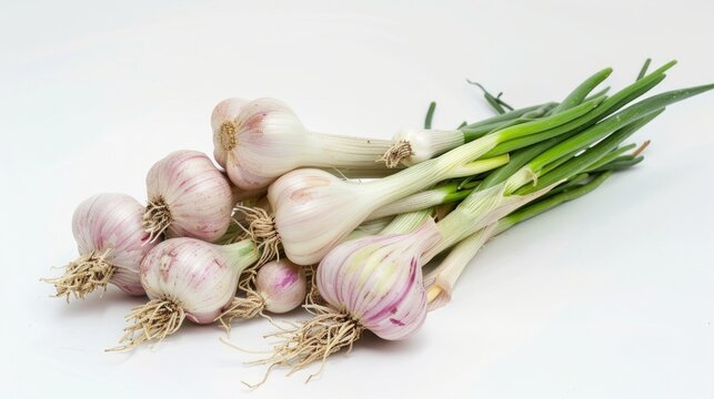 Pile of fresh garlic bulbs, ideal for cooking and seasoning.