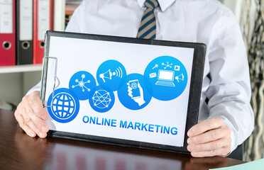 Online marketing concept on a clipboard
