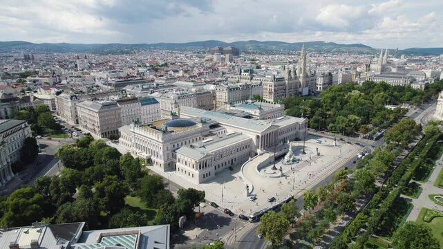 Aerial overview of the Austrian Parliament building in Vienna, showcasing its neoclassical architecture and surrounding cityscape