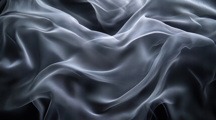 Obraz premium A close-up view of flowing, translucent fabric creating a soft, ethereal texture.