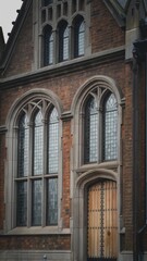 Gothic Architecture: Intricate Windows and Wooden Door