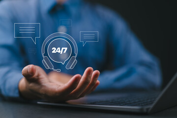 Naklejka premium Call center, online customer support concept. Businessman using laptop with call center icon for personal assistant service. Contact us, customer service and personal advisor.