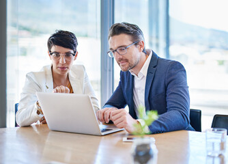 Office, teamwork and business people with laptop for feedback, planning or update website for company. Discussion, assistant and manager with digital for corporate research, project results or advice