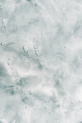 Transparent gel texture on a white background.