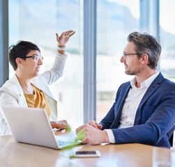 Office, teamwork and business people with laptop for talking, planning and update website for...