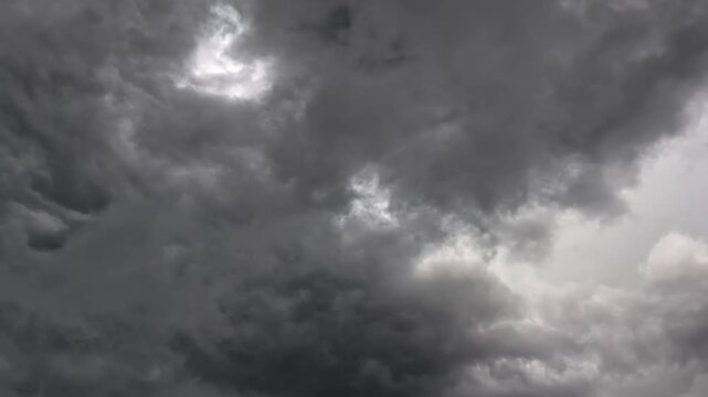 A stormy sky with dark clouds on a summer day.