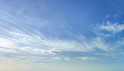 Fototapeta premium Expansive Blue Sky with Soft Clouds for Serenity and Inspiration