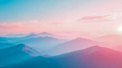 Obraz premium A serene landscape capturing mist-covered mountain peaks bathed in the soft, ethereal light of early morning, evoking peace and wonder.