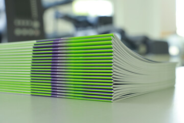 Stitched printing brochures in the bookbindery or print shop. Print sorted with spine. Lettershop...