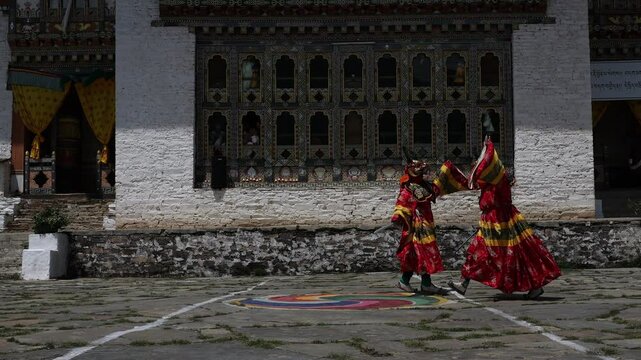 Mask dancers at the annual Ura Yakchoe festival, Bumthang, Ura, Bhutan