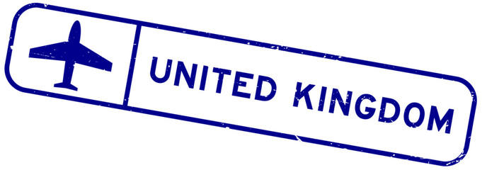 Grunge blue united kingdom word with plane icon square rubber seal stamp on white background